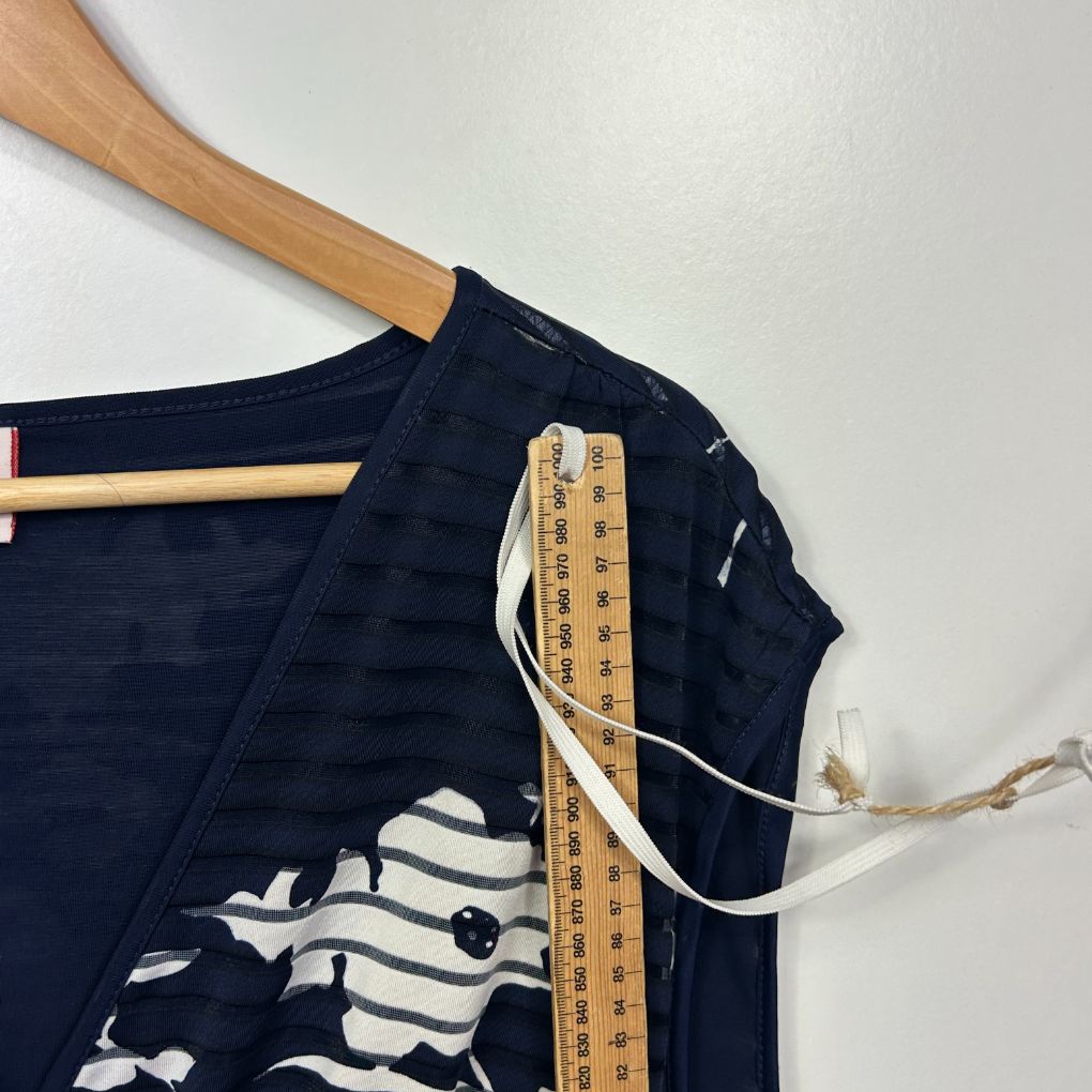 Navy graphic t-shirt front view with measurement tape