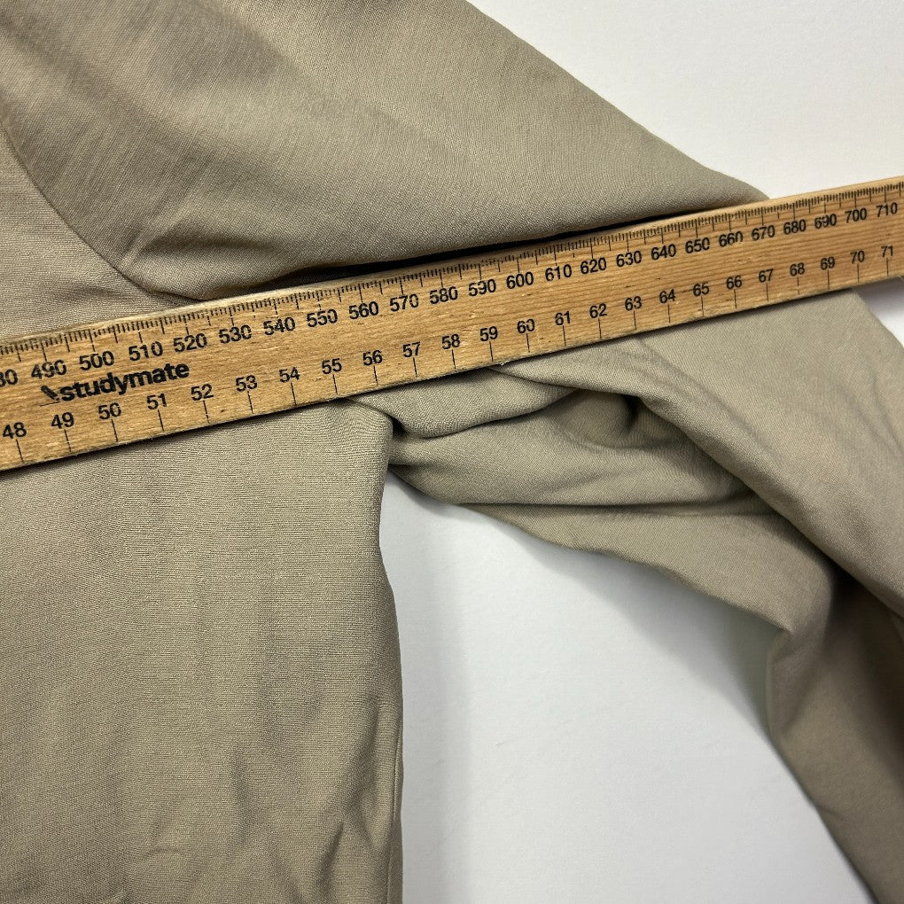 Beige fabric with measuring tape detail view
