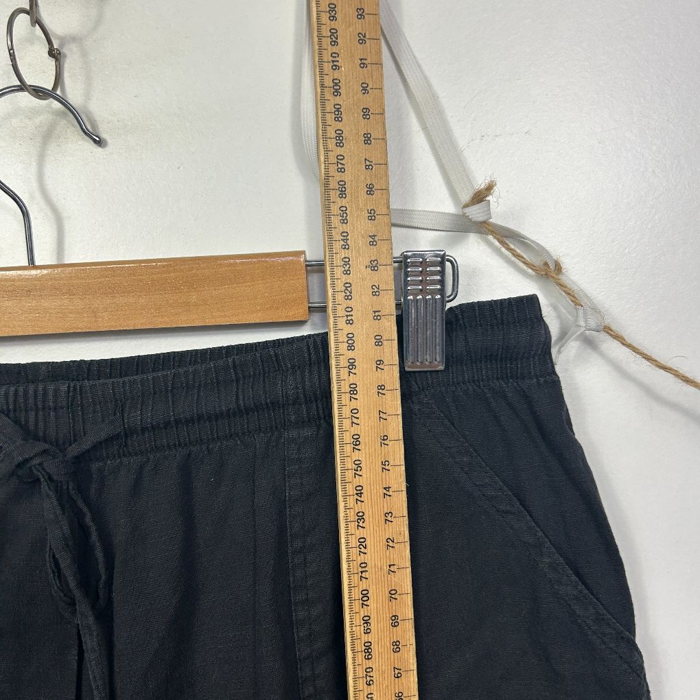 Black shorts front view with measurement