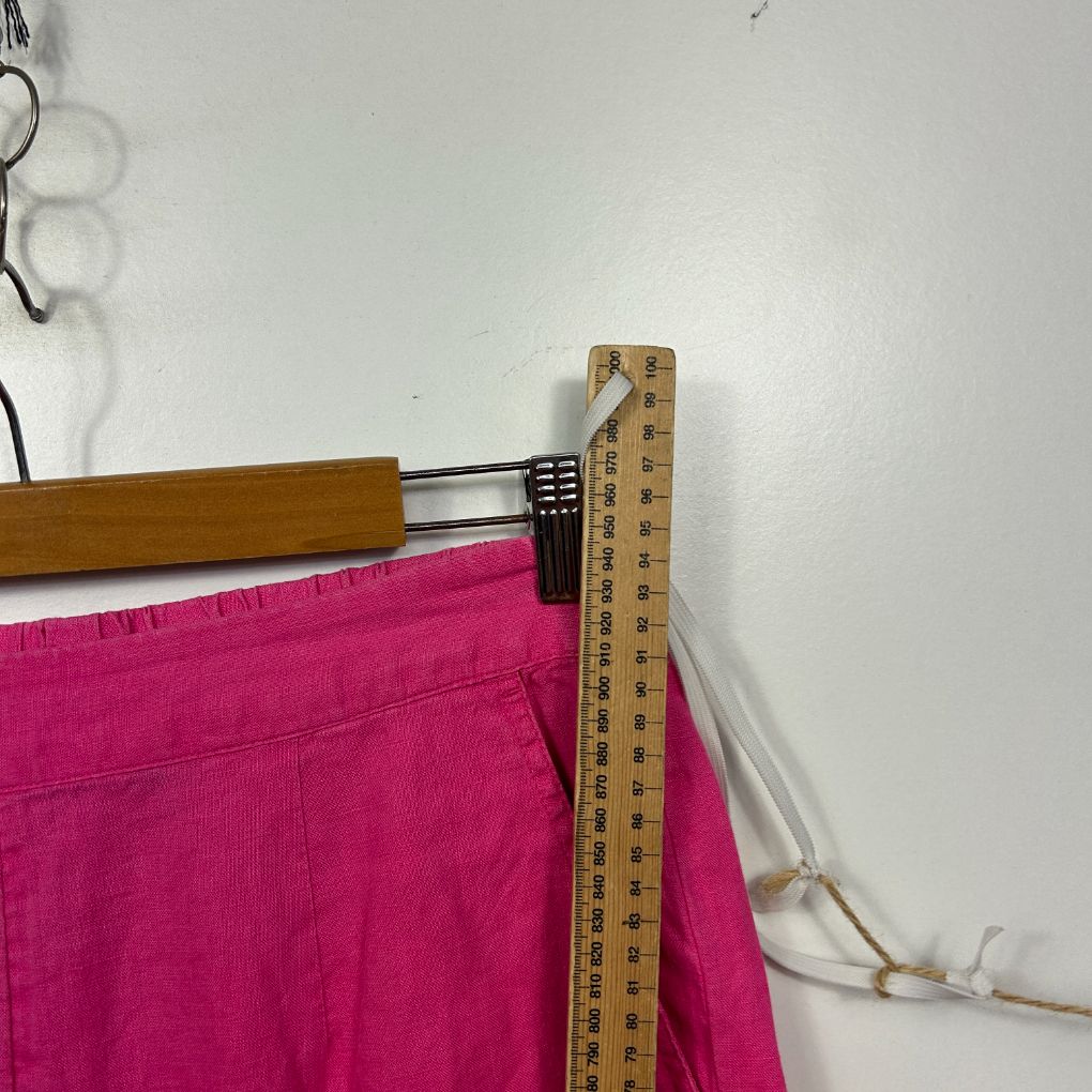 Pink top detail view with measurement