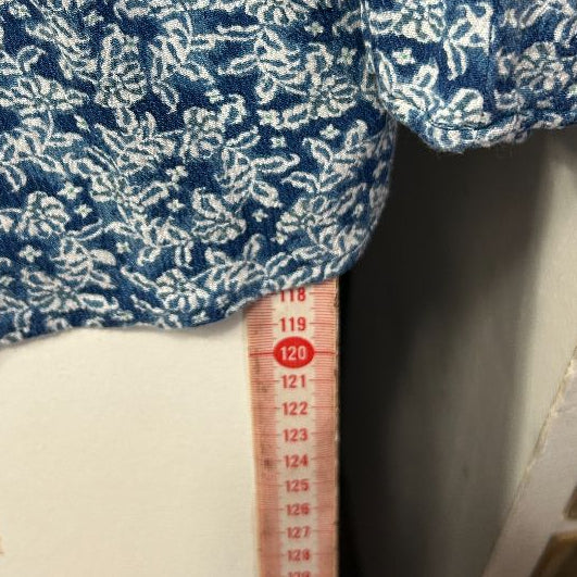 Blue and white floral print shirt front view