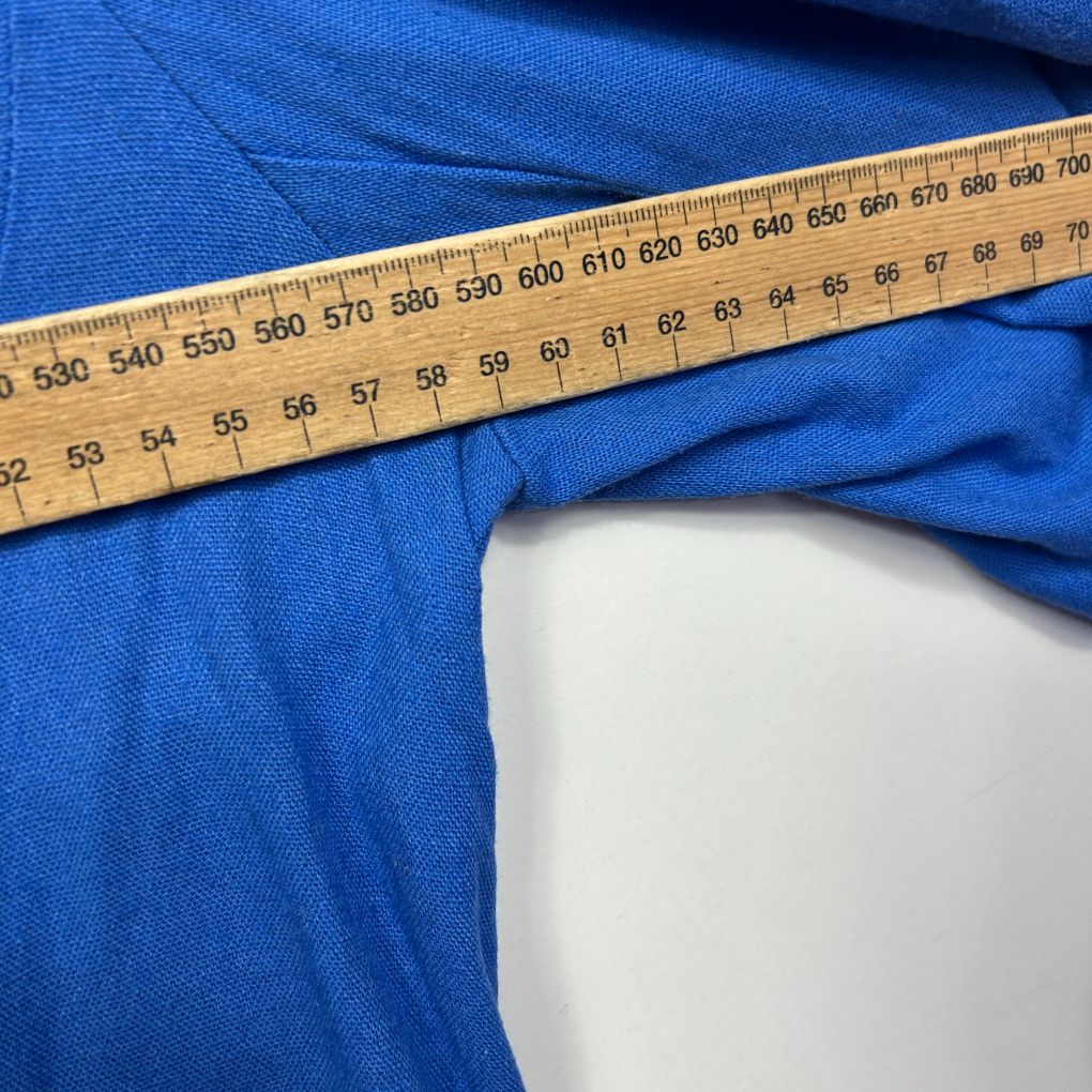 Blue fabric with measuring tape detail view
