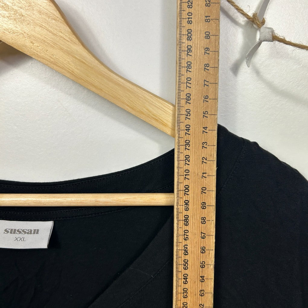 Black top front view with wooden hanger and measuring tape