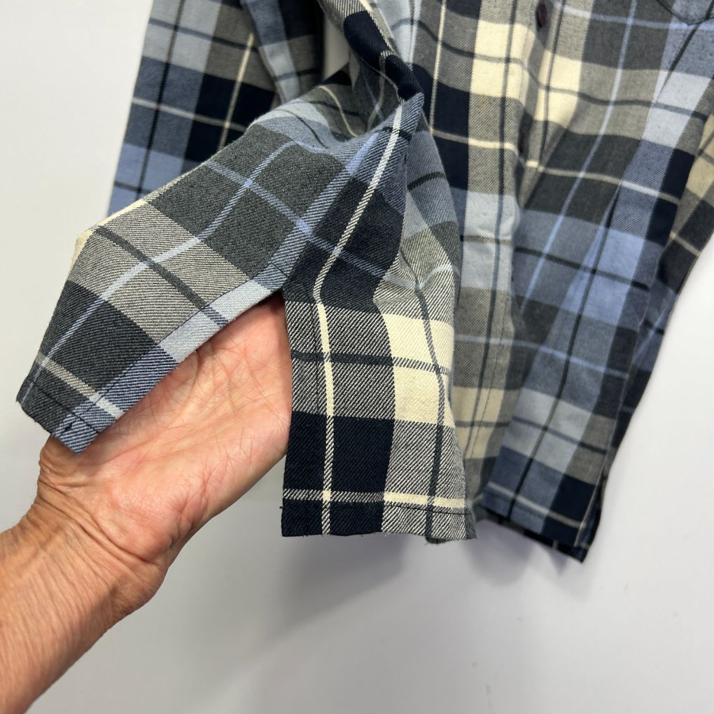 Grey and navy plaid shirt detail view