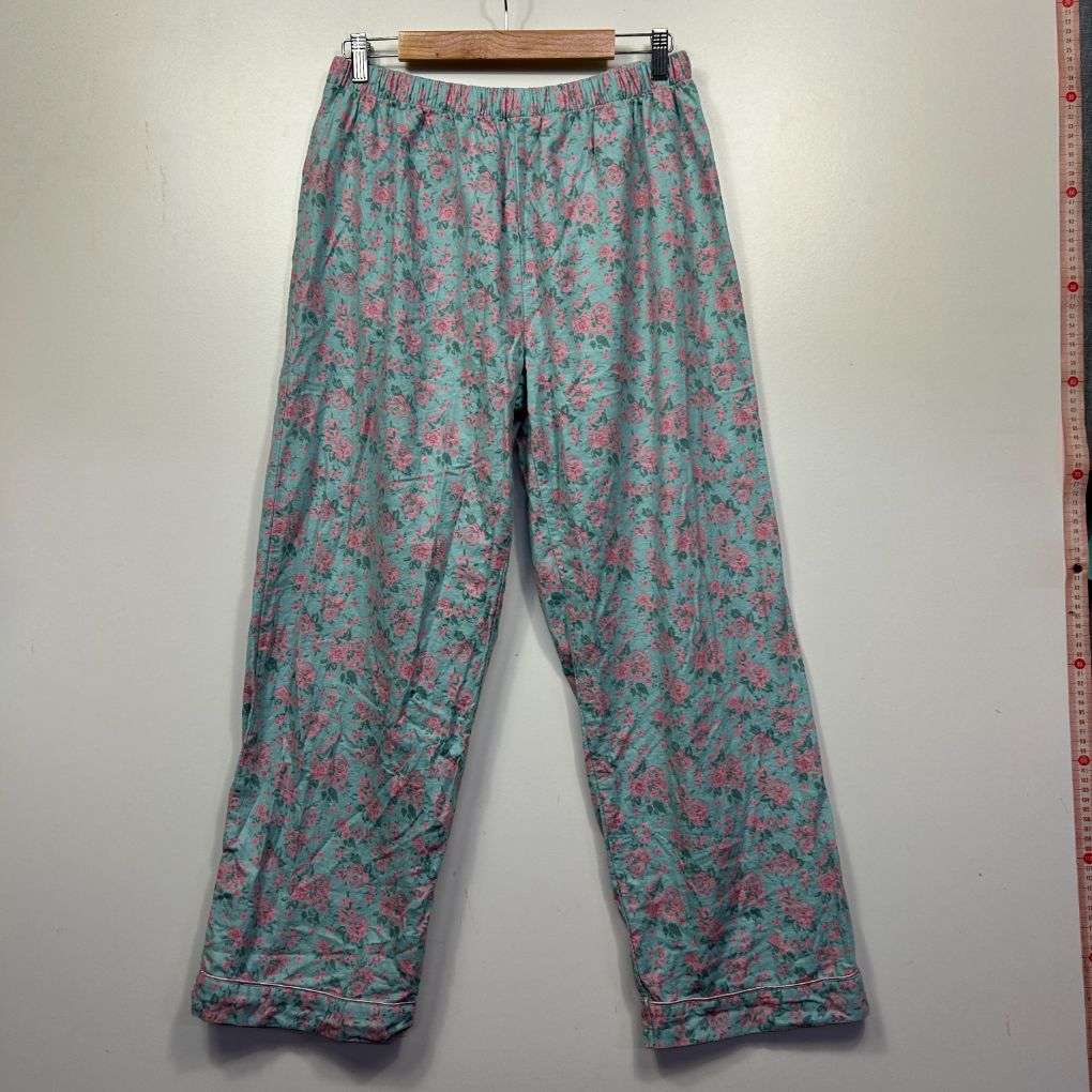 Teal floral pajama pants front view