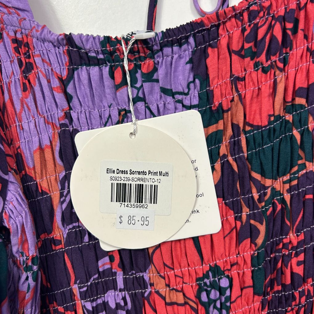 Colorful graphic print shirt detail view with price tag