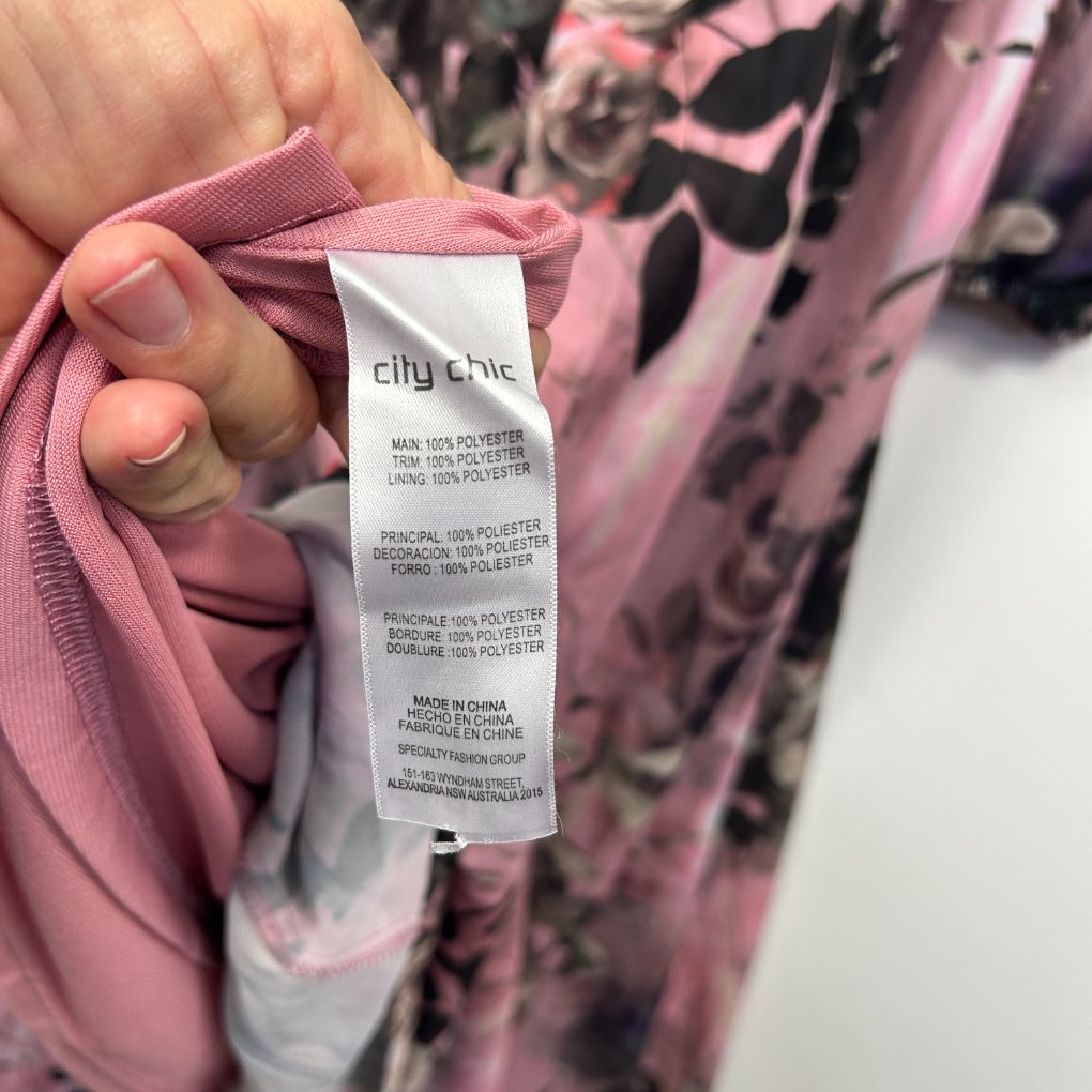 Pink floral garment label detail view
