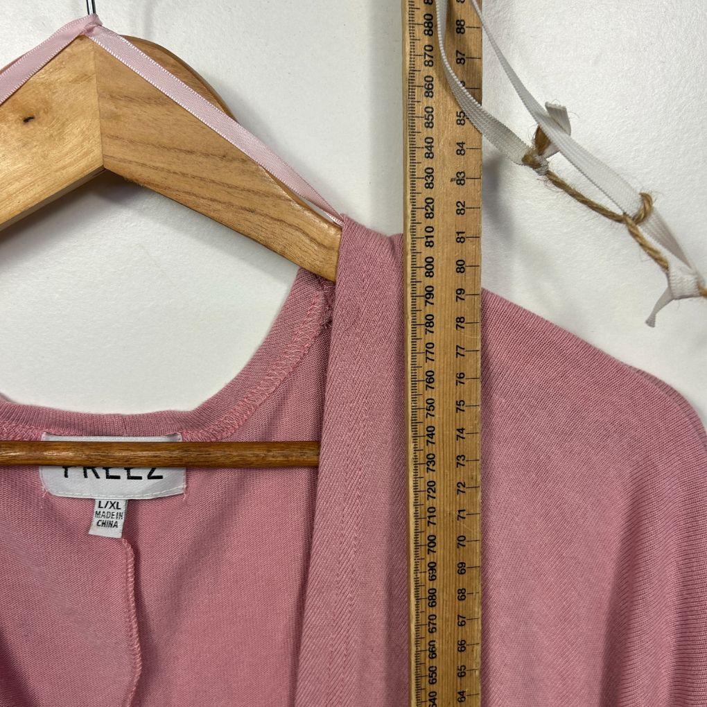Mauve long sleeve top front view with measuring tape
