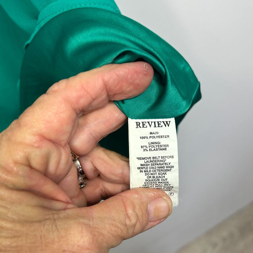 Green garment label detail view
