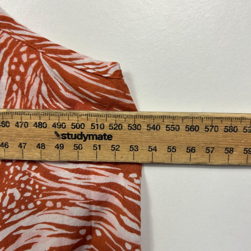 Red and white zebra striped fabric detail view