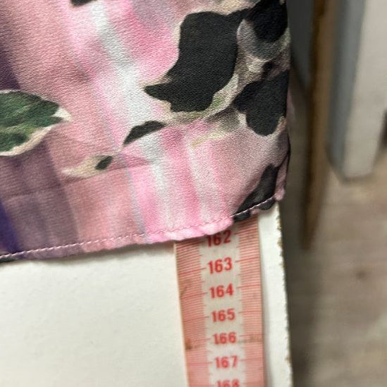 Pink and purple floral top detail view