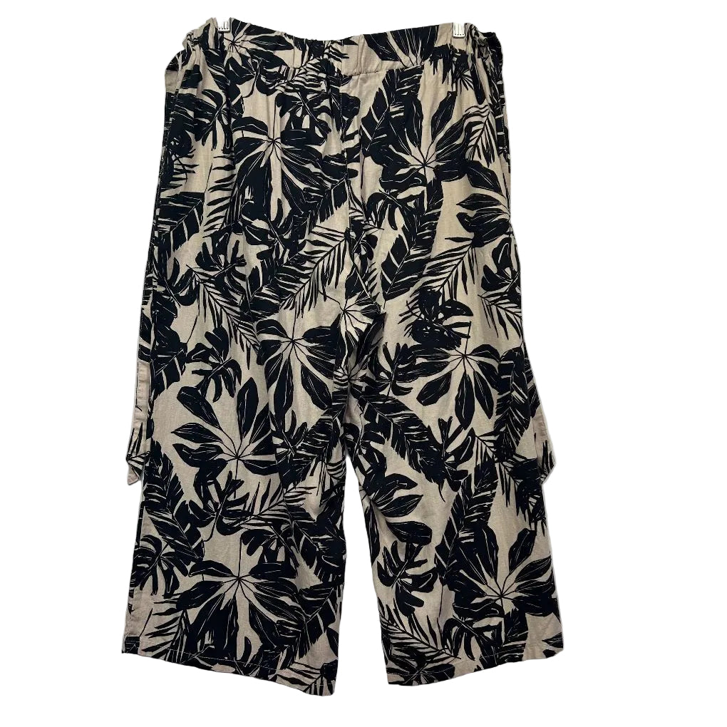 Black and cream floral cargo pants front view