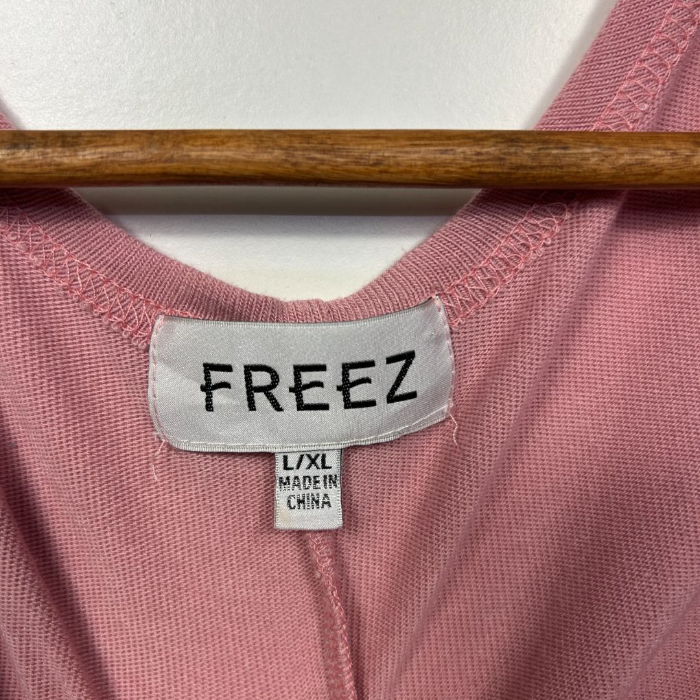 Pink ribbed long sleeve top label view