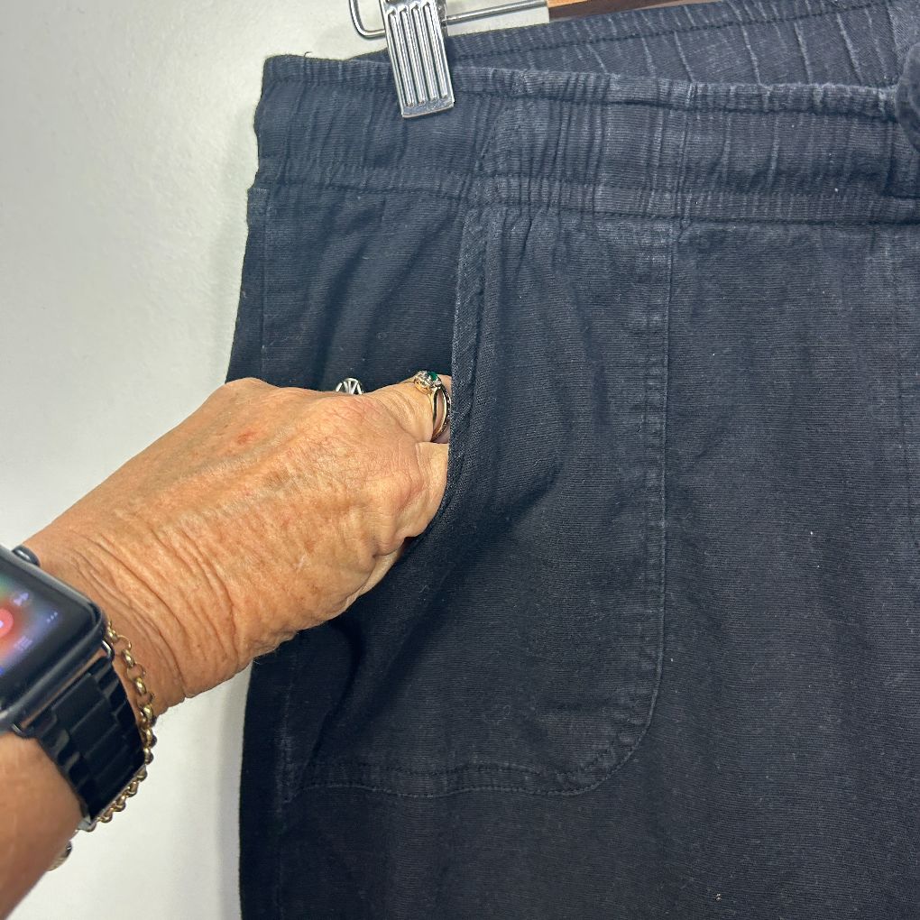 Dark blue denim pants front view