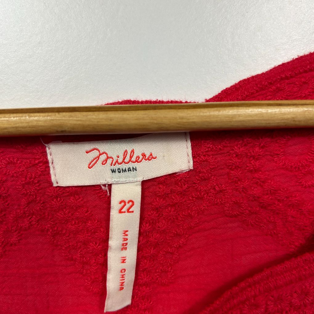 Red cardigan label detail view