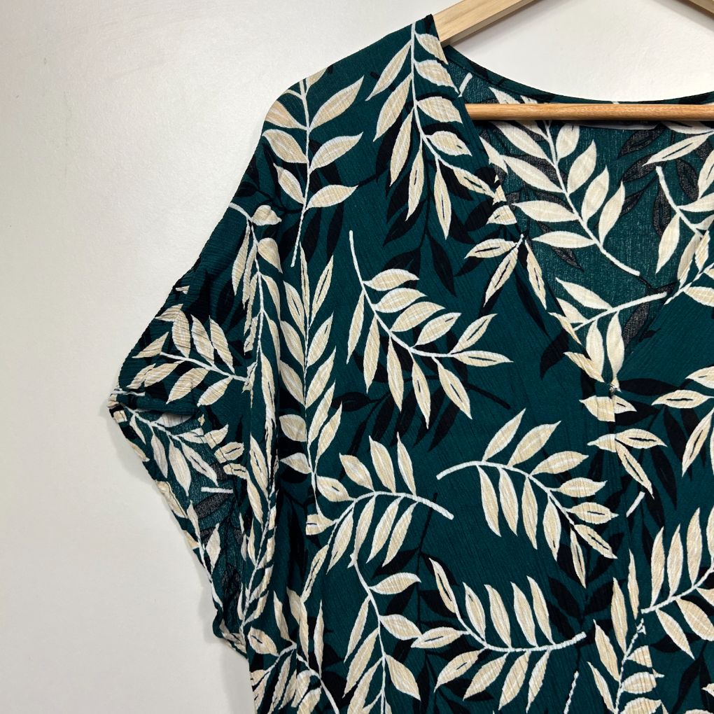 Dark teal leaf print top front view