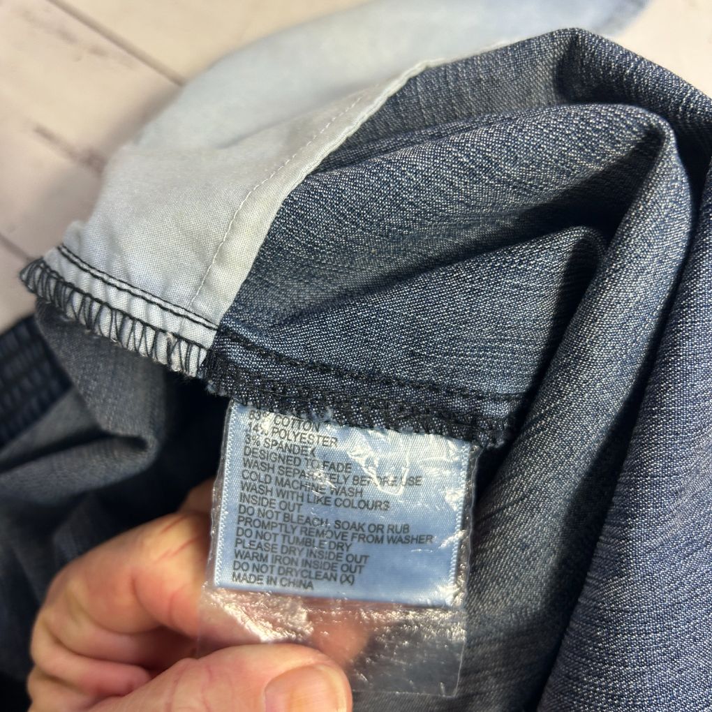 Grey garment label detail view