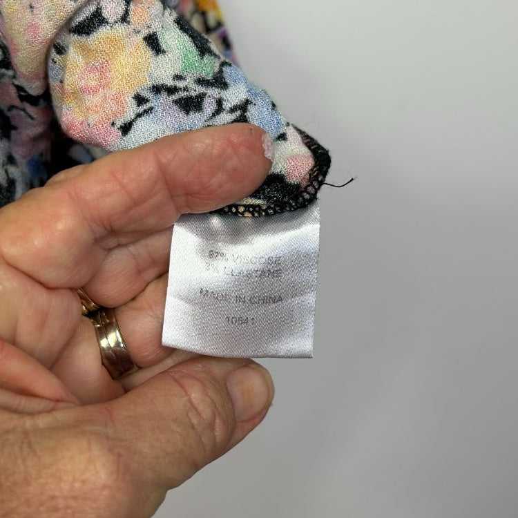 Colorful floral garment label detail view