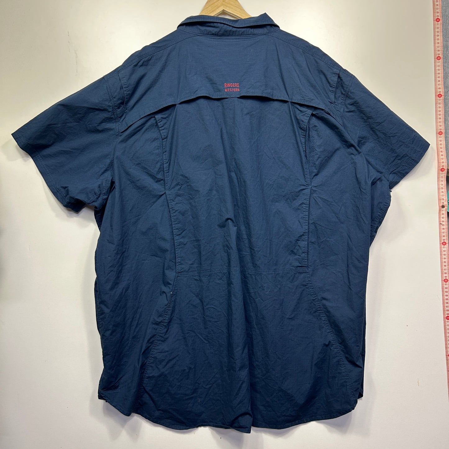 Navy short sleeve shirt back view