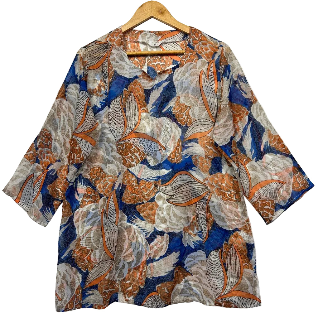 Blue orange and cream patterned tunic top front view