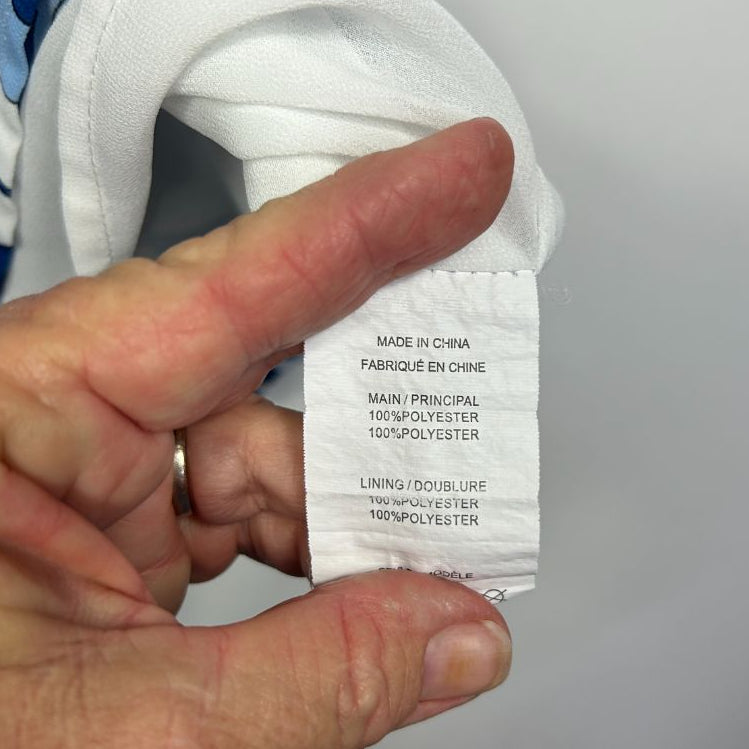 White clothing label detail view