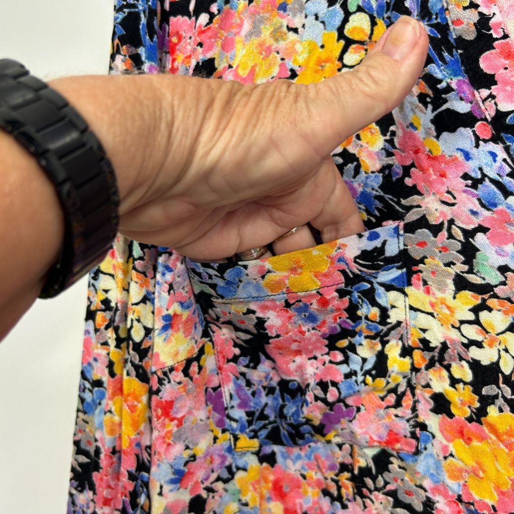 Colorful floral dress detail view