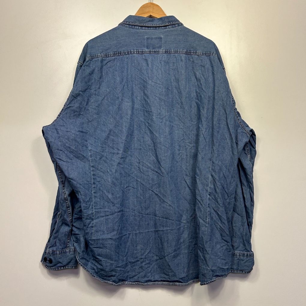 Blue denim shirt back view