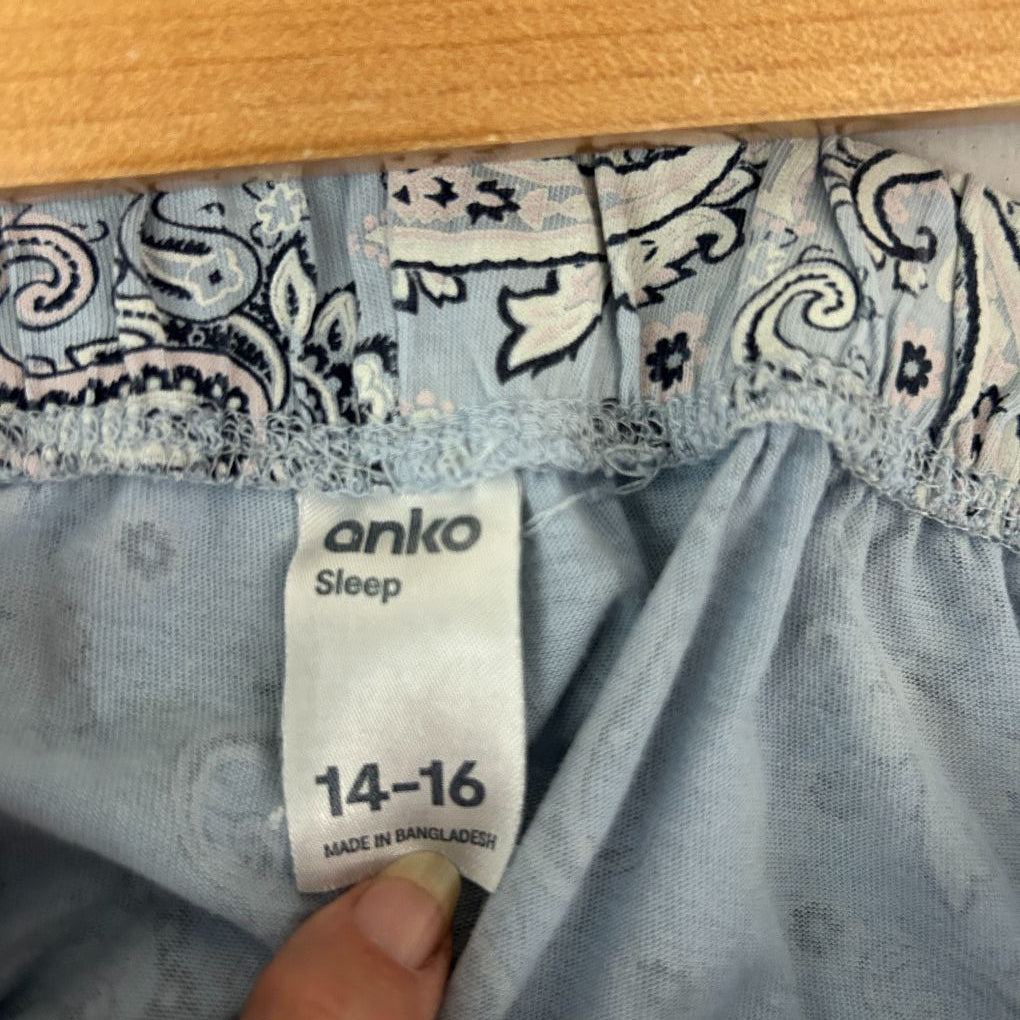 Blue and white patterned fabric label detail view