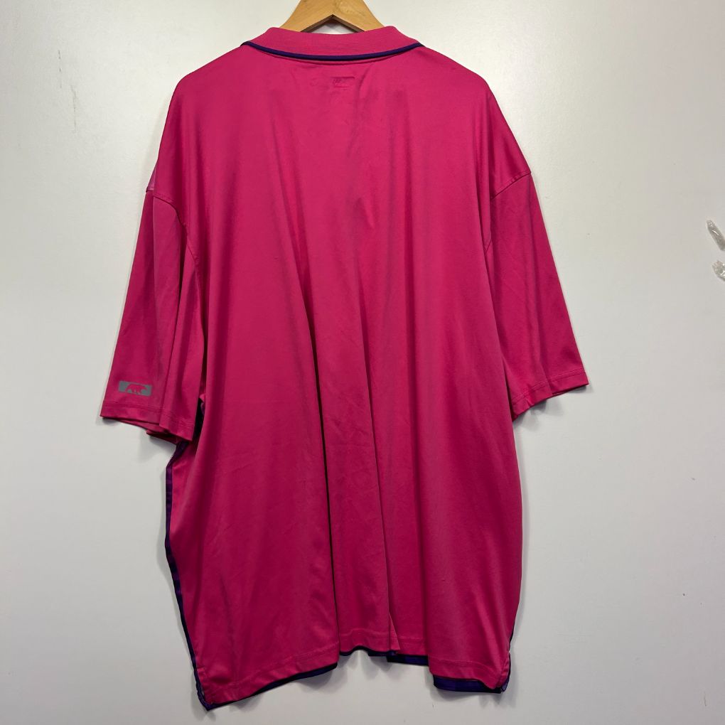 Pink polo shirt back view