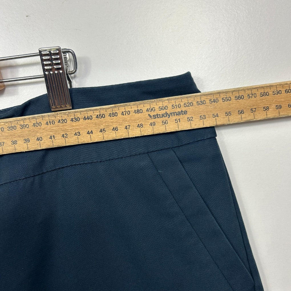Navy blue shorts front view with measuring tape