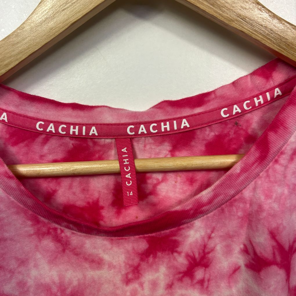 Pink tie dye t-shirt detail view showing neckline and brand label
