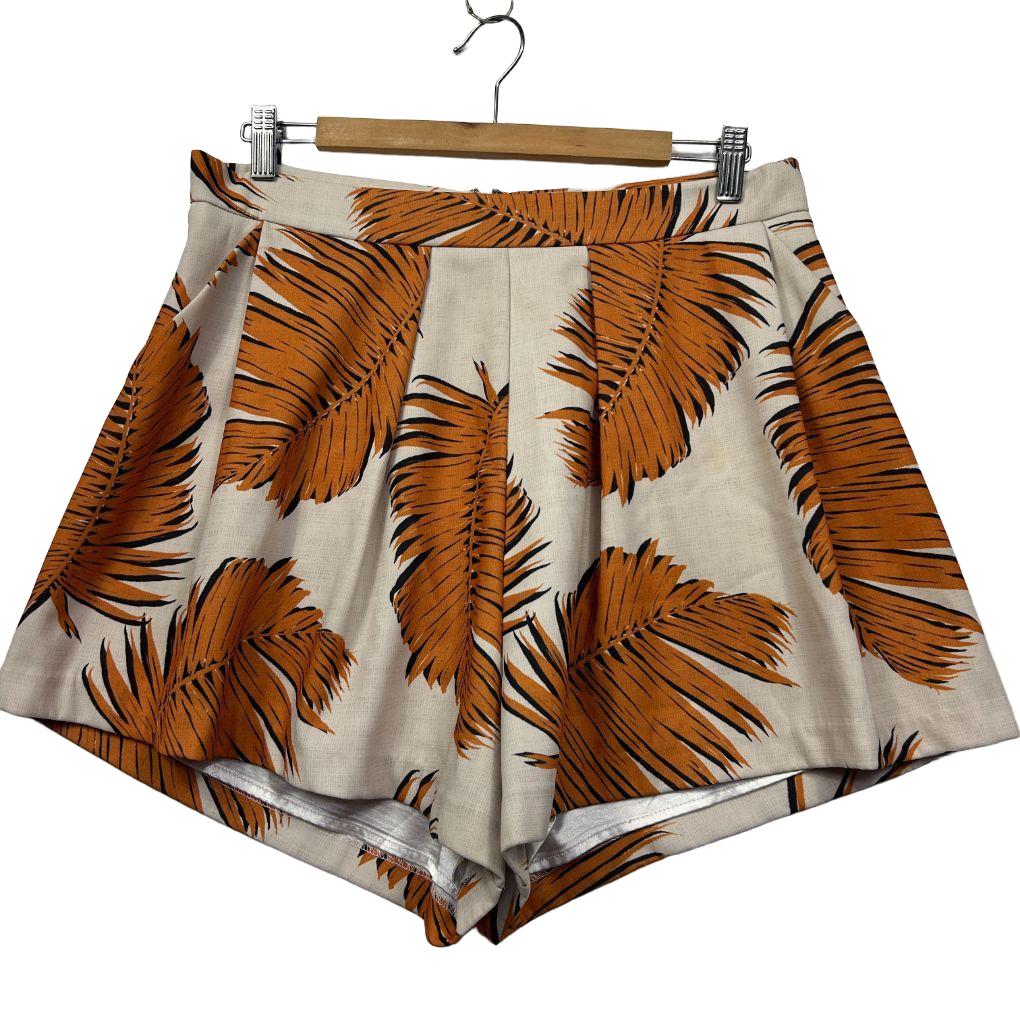 Cream shorts with brown feather print front view