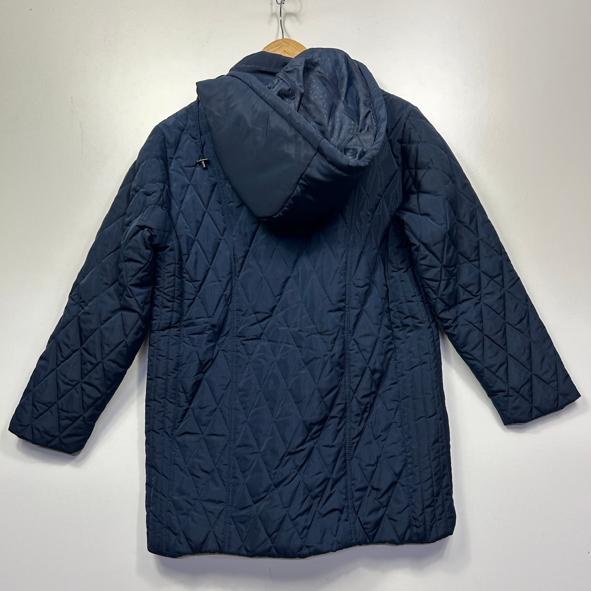 Navy quilted puffer jacket back view