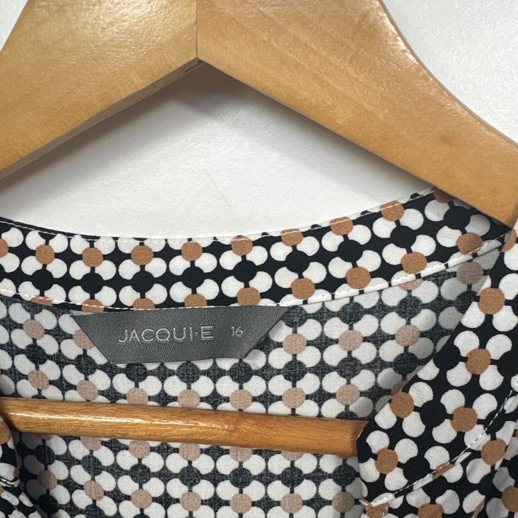 Black and white polka dot top label detail view