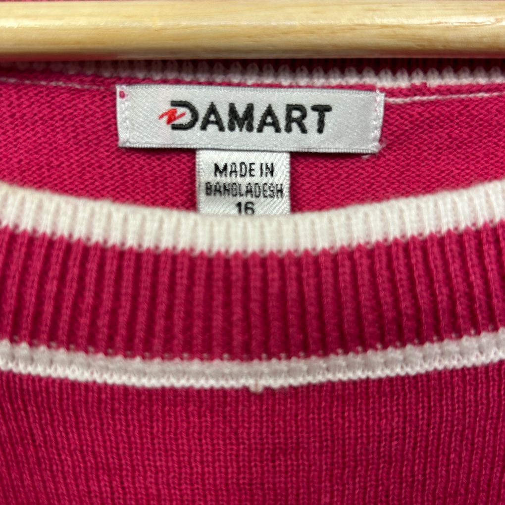 Red and white striped knit sweater label detail