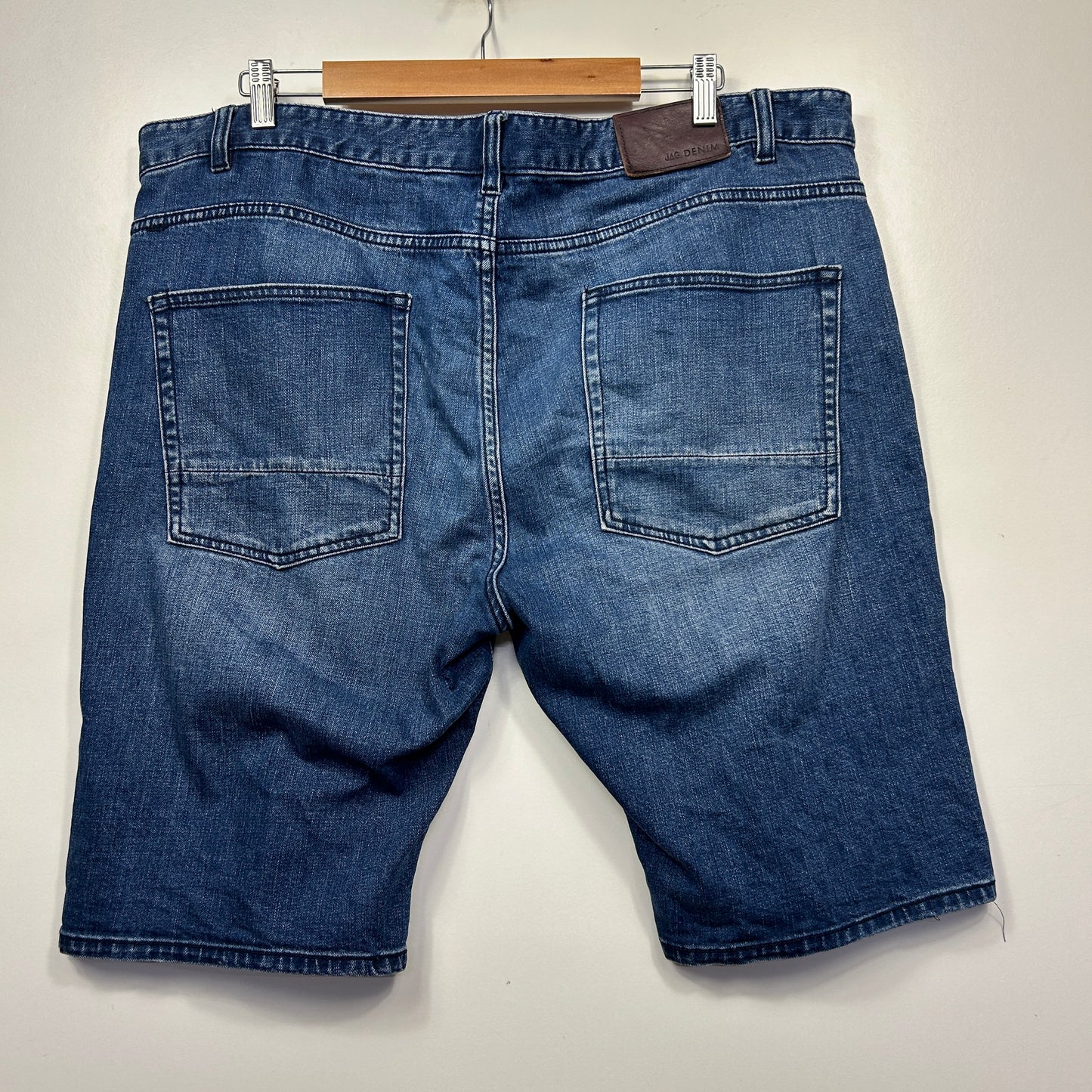 Blue denim shorts back view