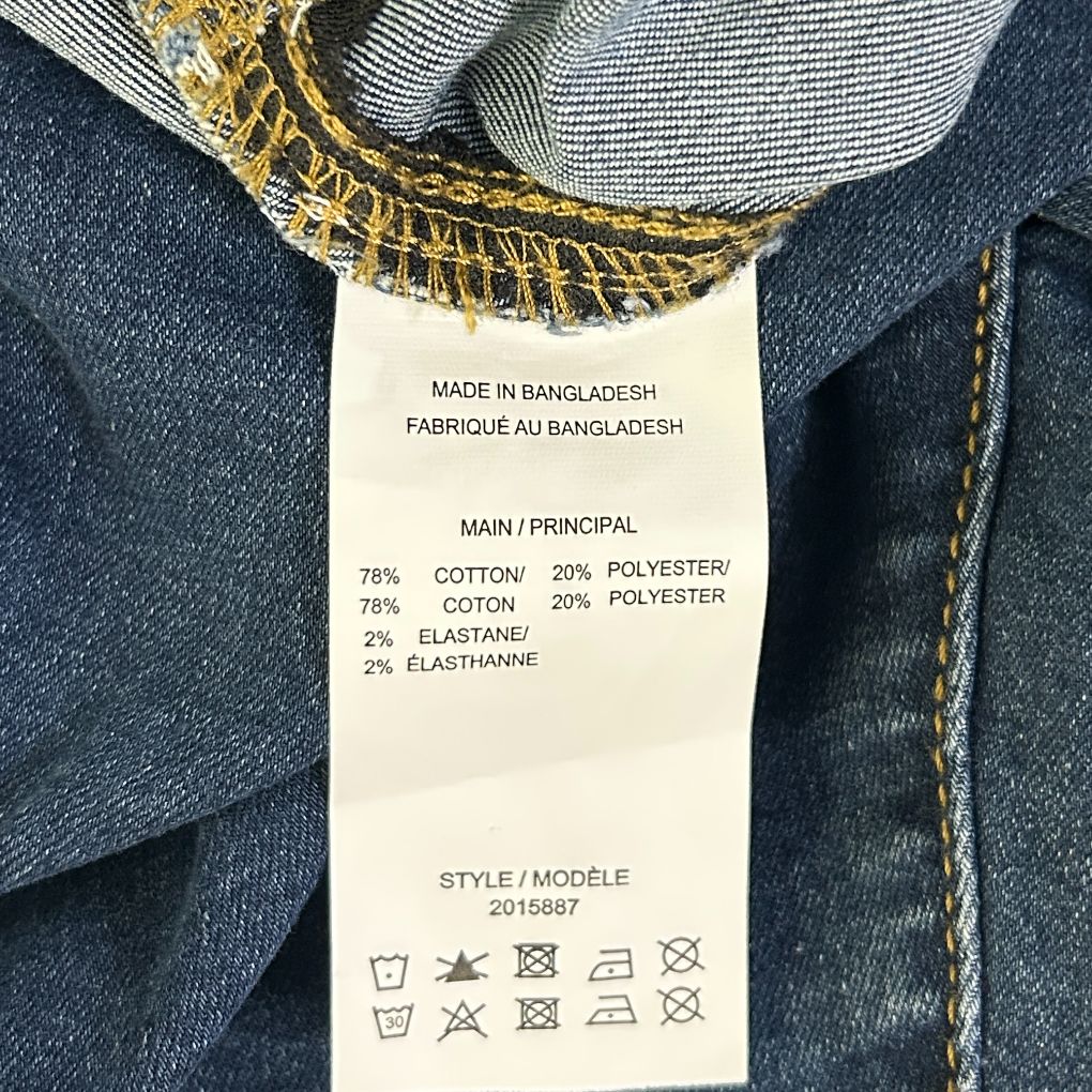 Blue denim jeans label detail view