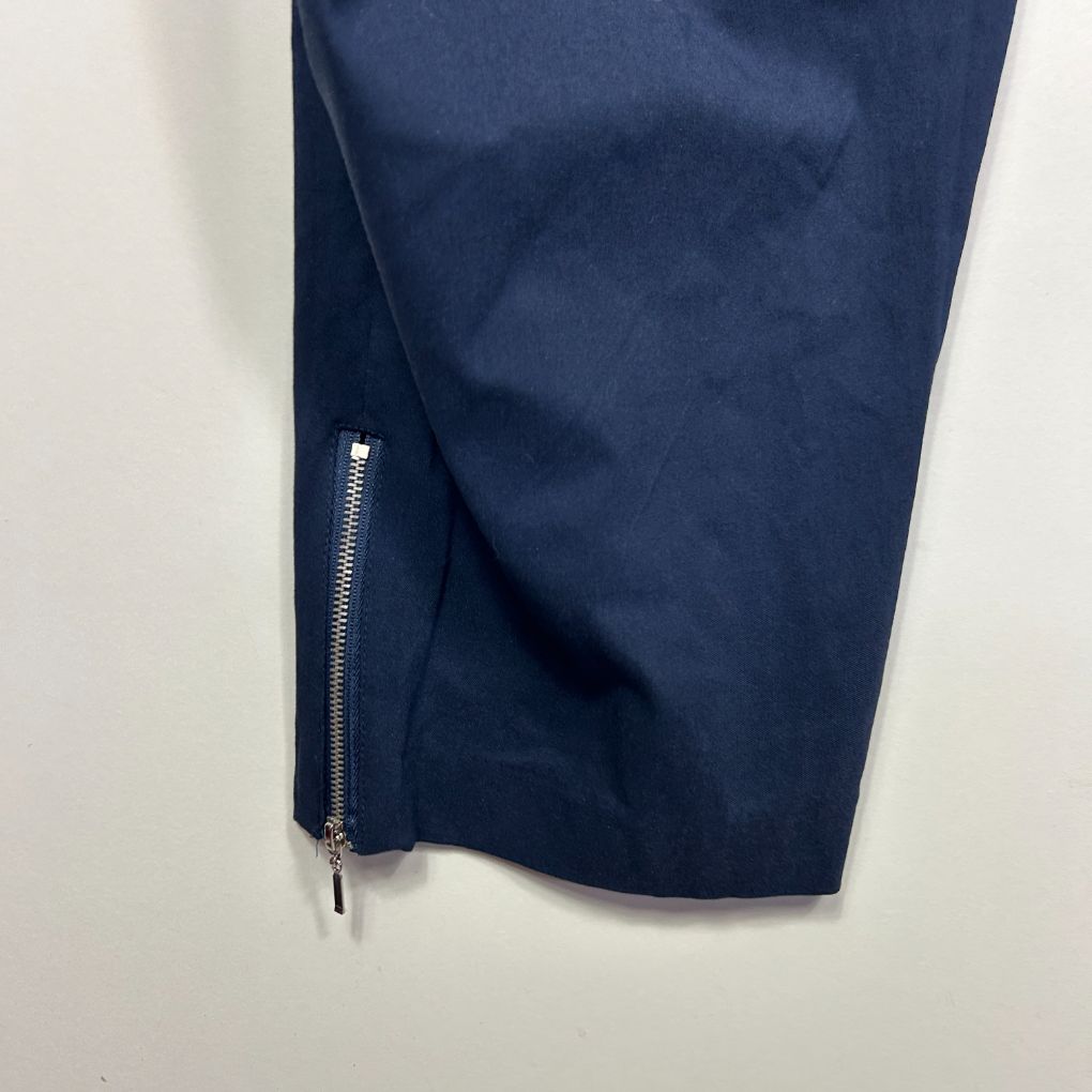 Navy blue pants side view with zipper detail
