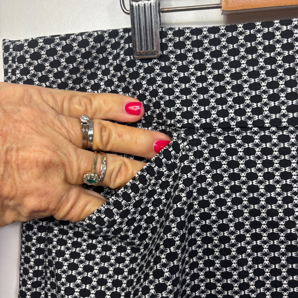Black and white geometric patterned pants detail view