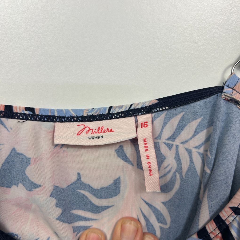 Blue and white floral shorts label detail view