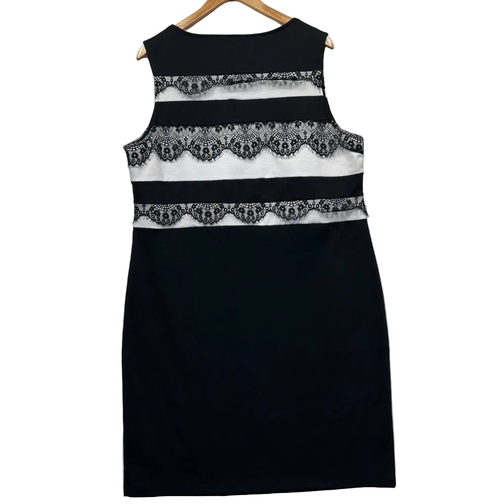 Black sleeveless dress front view with white lace stripe detail