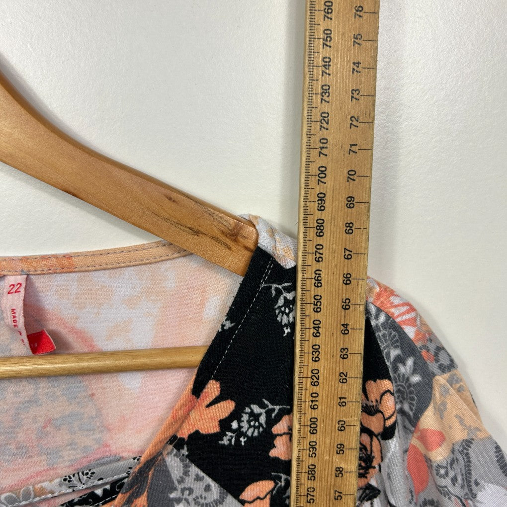 Floral dress front view with measuring tape