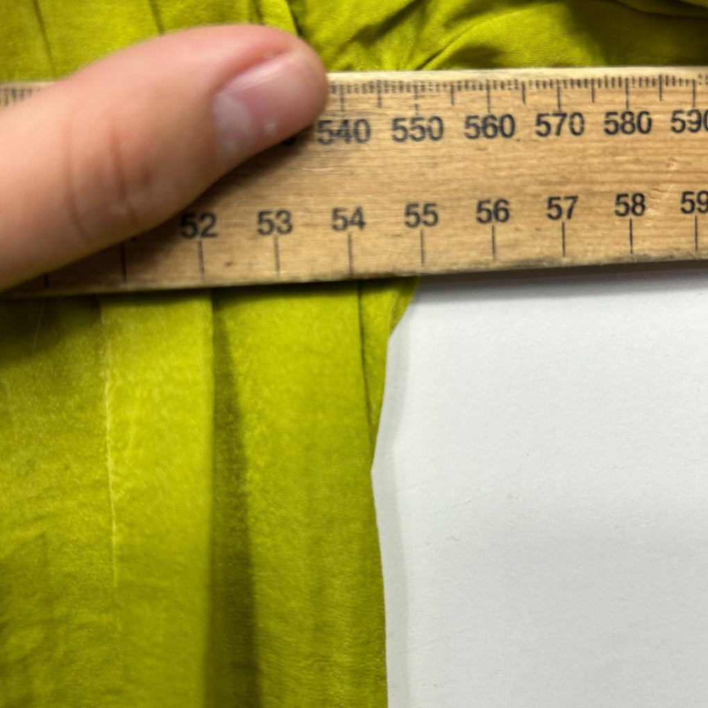 Lime green fabric detail view with measuring ruler