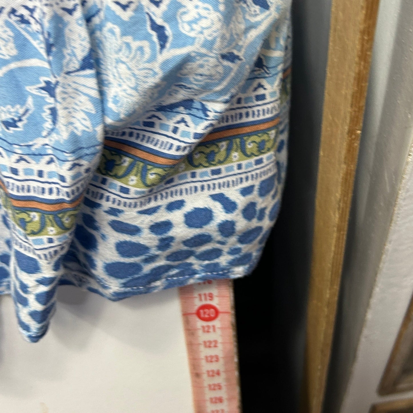Blue and white floral print dress detail view