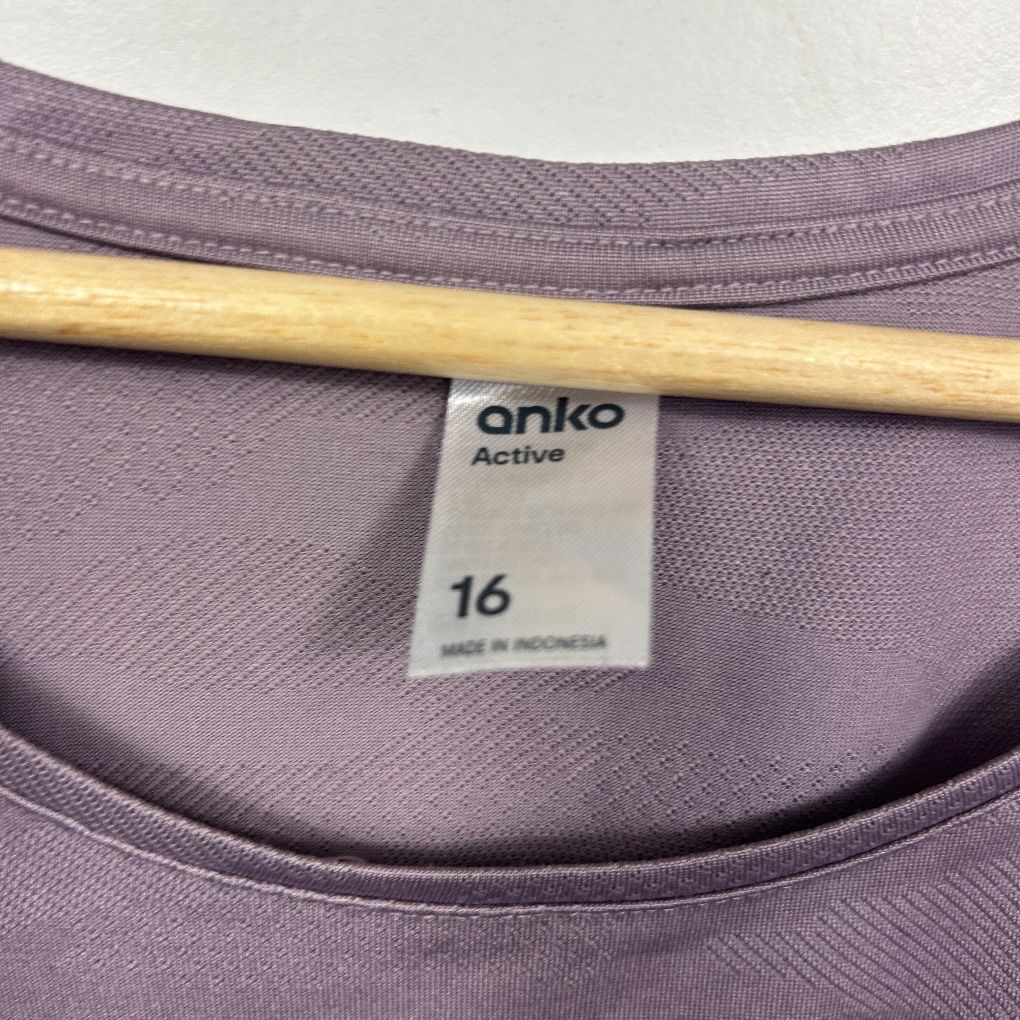 Purple t-shirt label detail view