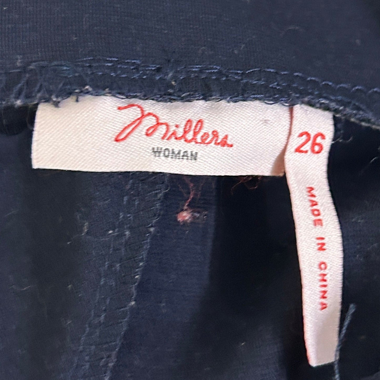 Navy pants label detail view