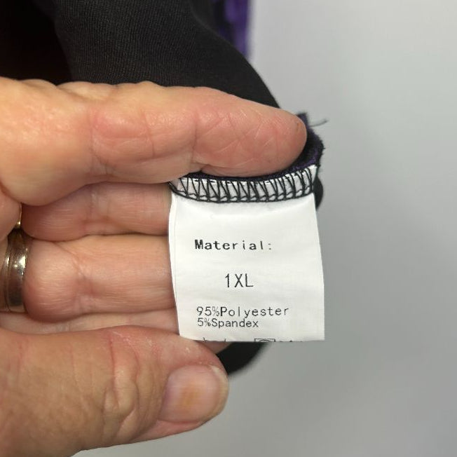 Black garment size label detail view