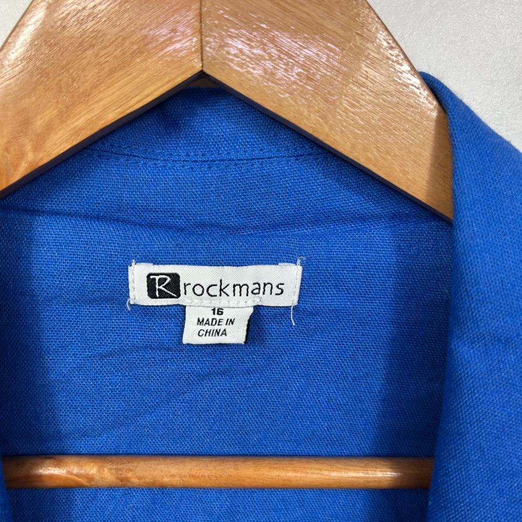 Blue cardigan label detail view