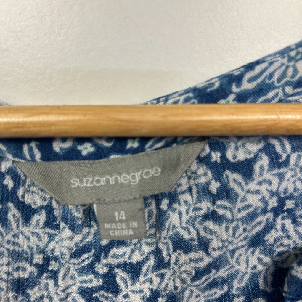 Blue and white floral print top label detail view