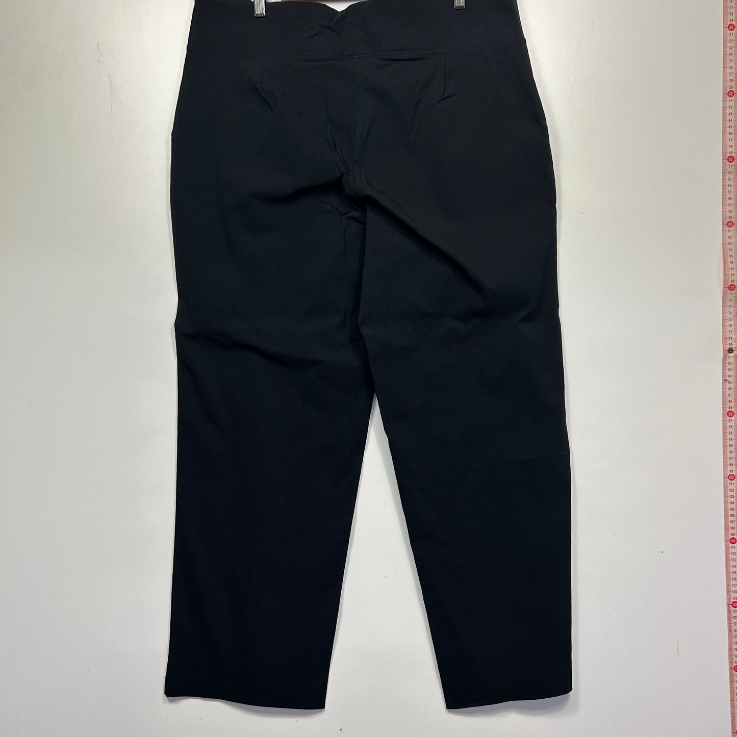 Black trousers back view